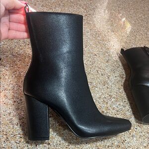 Sleek Black Heeled Boots